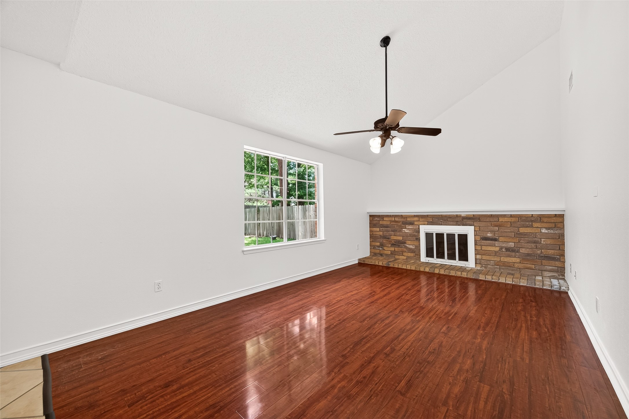 42 Rockridge Drive Spring, TX 77381 - Photo 8 of 39 Family room off of kitchen with cozy fireplace.