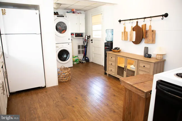 a utility room with dryer and washer