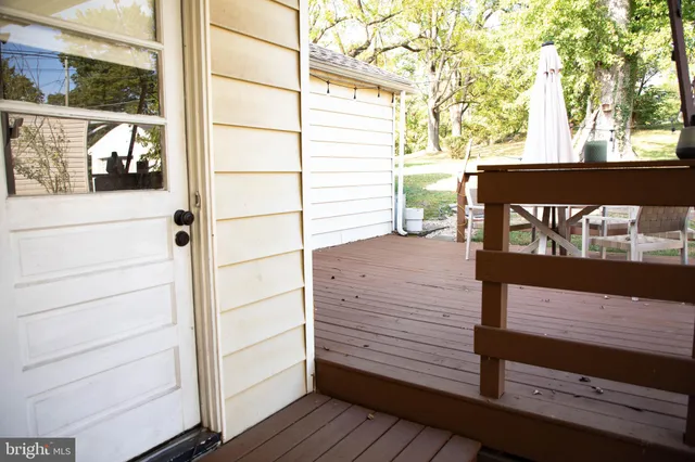 a view of a yard with an outdoor space