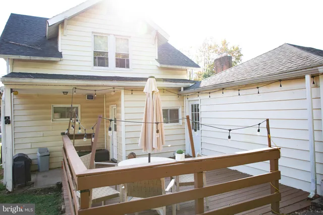 a view of a bird house next to a yard