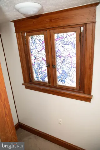 a bathroom with a sink vanity and a mirror