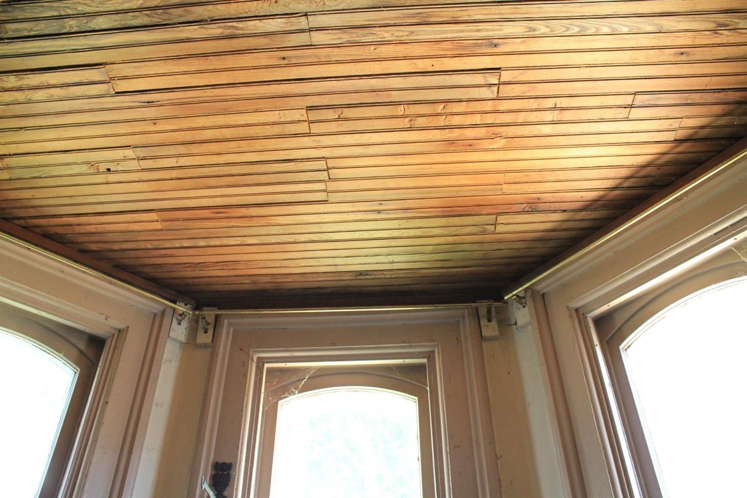 301 South Walnut Street Rising Sun, IN 47040 - Photo 7 of 36 Wainscoting that adorns the ceiling of the bay window and the 1st floor bathroom came from a 2-story Whitlock factory building that was located behind this home. This is where JW Whitlock's company produced the firs of the auto harps and later the music rolls. Another Whitlock, Kitty Whitlock, JW's sister, is a composer of many of the music rolls produced for the auto harp.