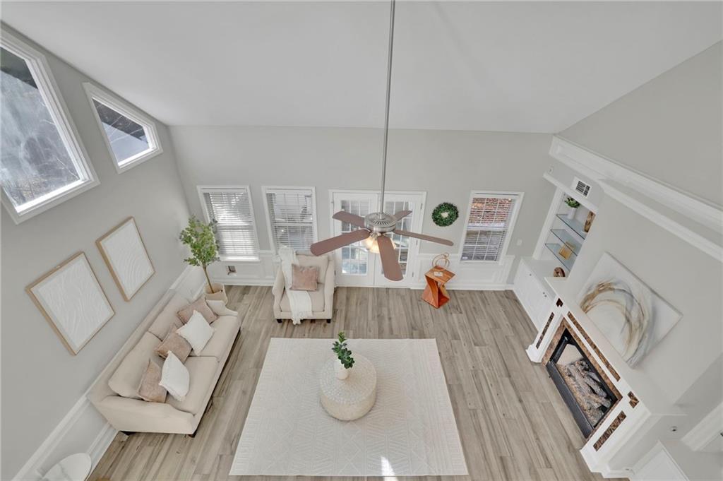 5696 Kilrush Court Mableton, GA 30126 - Photo 12 of 46 a living room with furniture and a wooden floor