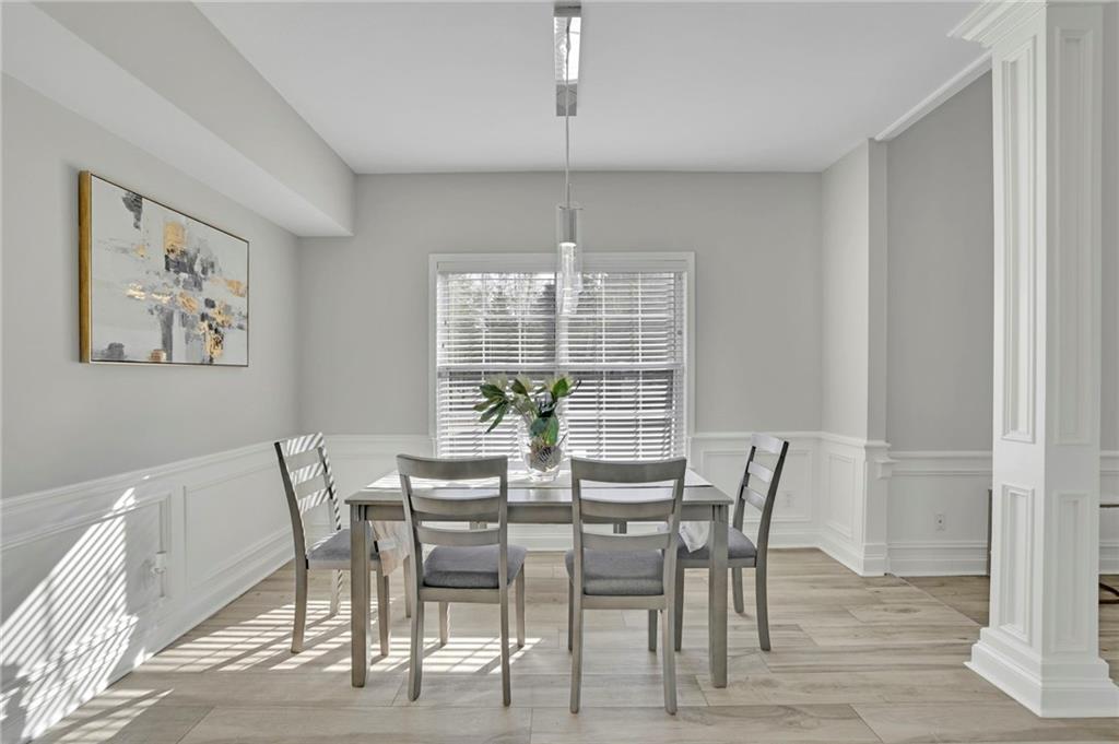 5696 Kilrush Court Mableton, GA 30126 - Photo 14 of 46 a view of a dining room with furniture window and outside view