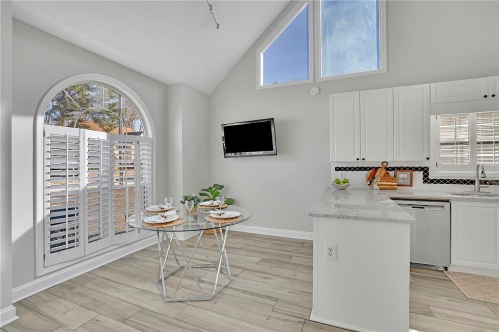 5696 Kilrush Court Mableton, GA 30126 - Photo 18 of 46 a workspace with wooden floor and a window