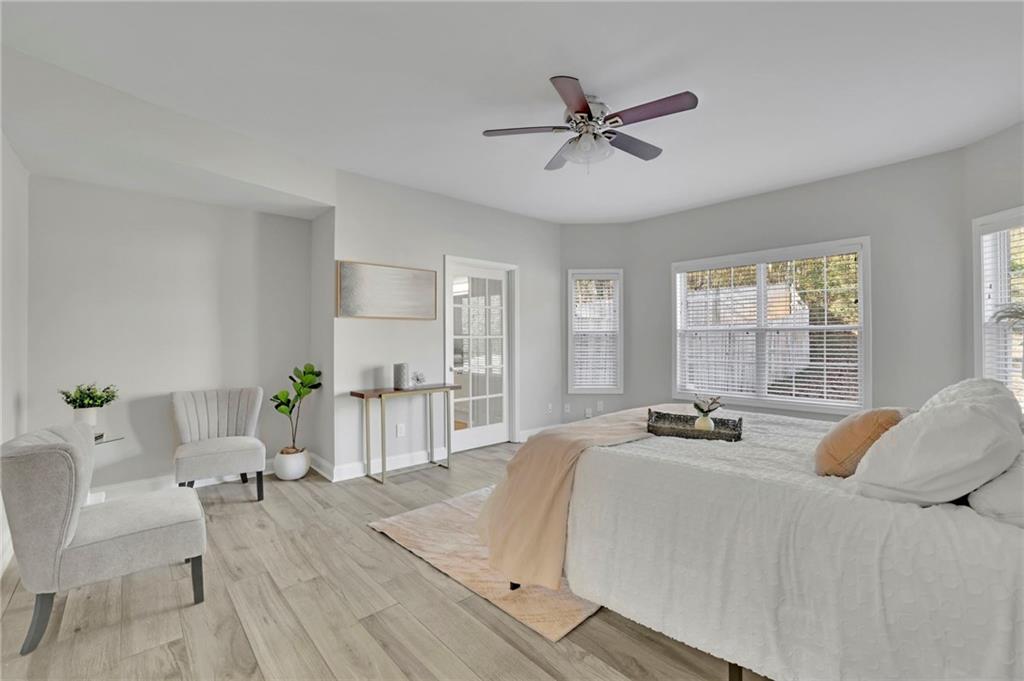 5696 Kilrush Court Mableton, GA 30126 - Photo 20 of 46 a bedroom with a bed and a chair