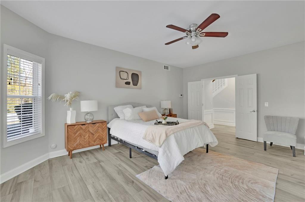 5696 Kilrush Court Mableton, GA 30126 - Photo 21 of 46 a bedroom with a bed and window