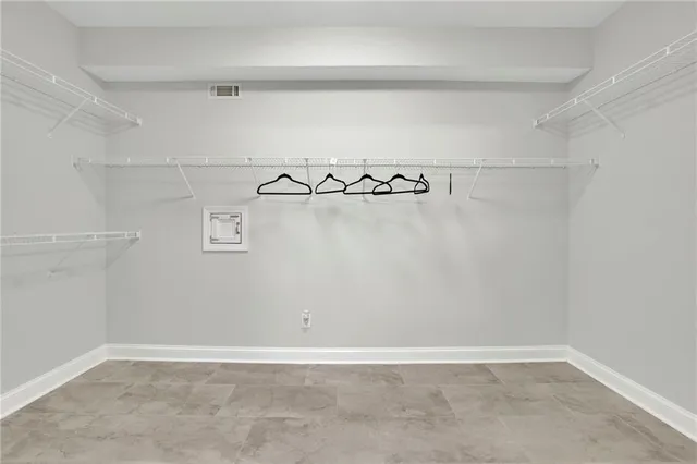 a view of a room with racks on the wall