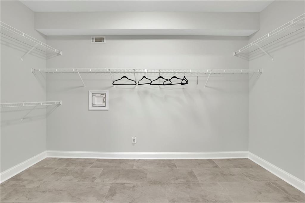 5696 Kilrush Court Mableton, GA 30126 - Photo 28 of 46 a view of a room with racks on the wall