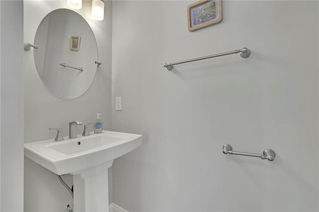 5696 Kilrush Court Mableton, GA 30126 - Photo 29 of 46 a bathroom with a sink and a mirror