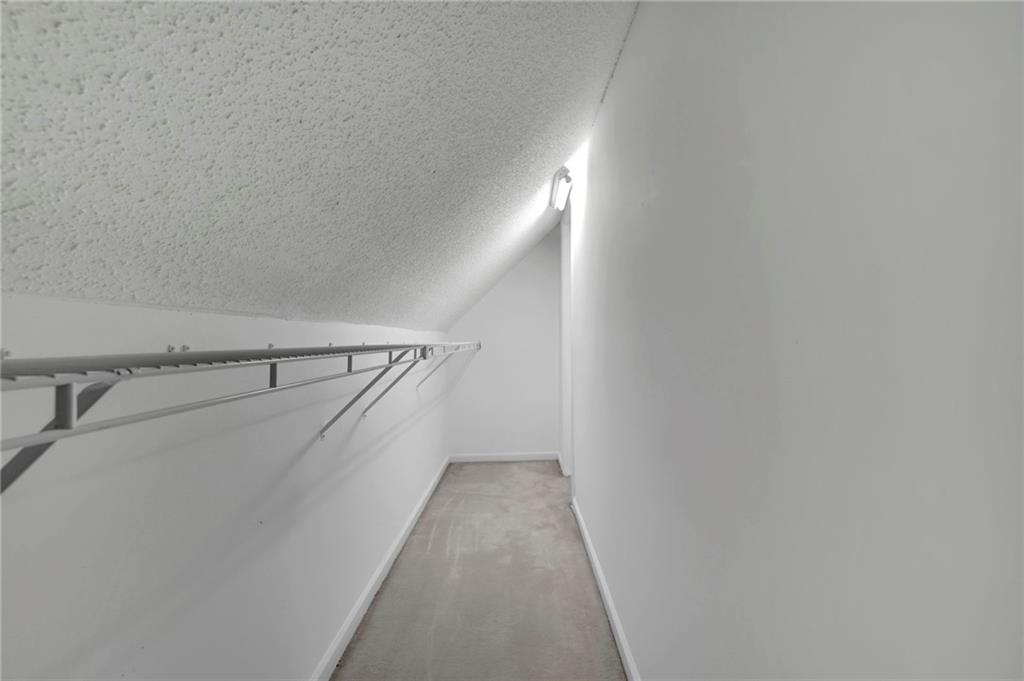 5696 Kilrush Court Mableton, GA 30126 - Photo 35 of 46 a view of a hallway with stairs