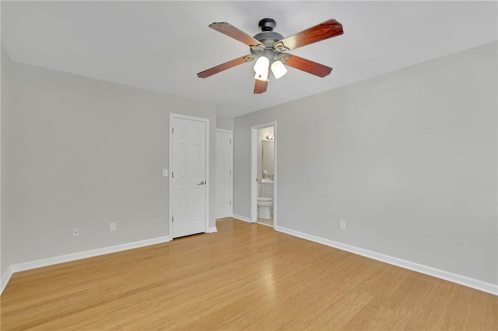 5696 Kilrush Court Mableton, GA 30126 - Photo 37 of 46 an empty room with a window and a fan