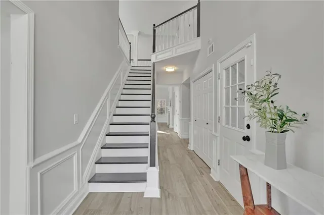 a view of entryway with wooden floor