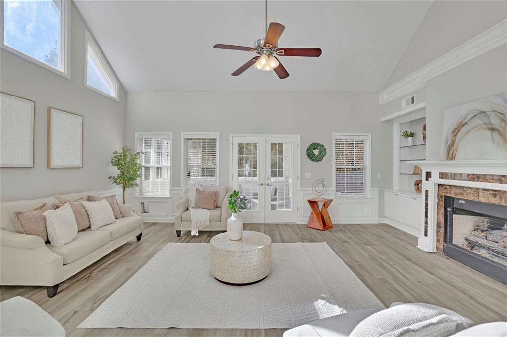 5696 Kilrush Court Mableton, GA 30126 - Photo 7 of 46 a living room with furniture and a fireplace