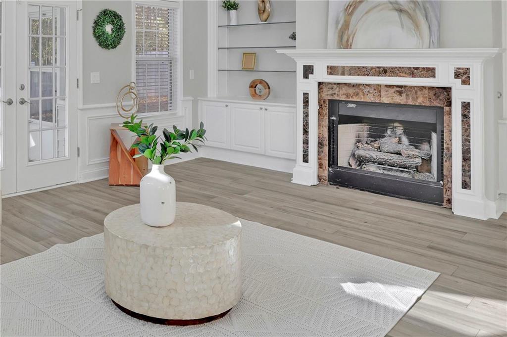 5696 Kilrush Court Mableton, GA 30126 - Photo 8 of 46 a living room with furniture and a fireplace