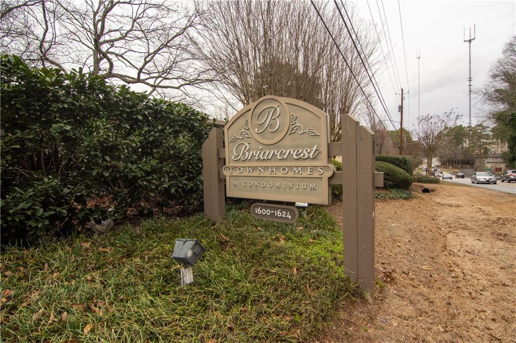 1612 Briarcliff Road Northeast, Unit 7 Atlanta, GA 30306 - Photo 29 of 29 a sign on the side of a road