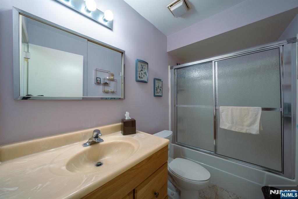 208 Federal Hill Road Pompton Lakes, NJ 07442 - Photo 13 of 22 a bathroom with a sink toilet and shower