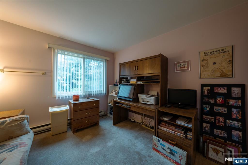 208 Federal Hill Road Pompton Lakes, NJ 07442 - Photo 17 of 22 a room with furniture and a window