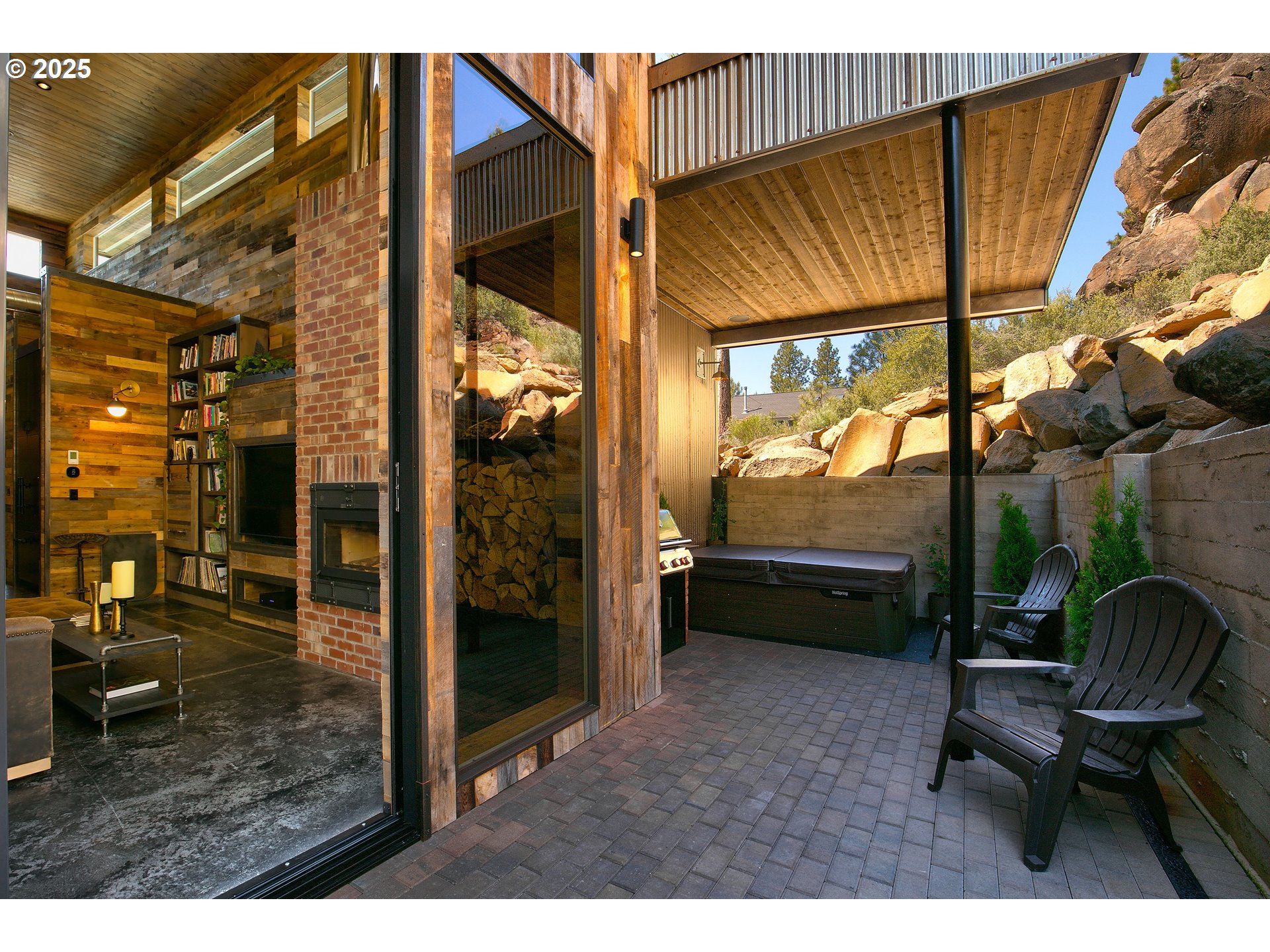 19476 Southwest Century Drive Bend, OR 97702 - Photo 11 of 44 a balcony with chairs and a table