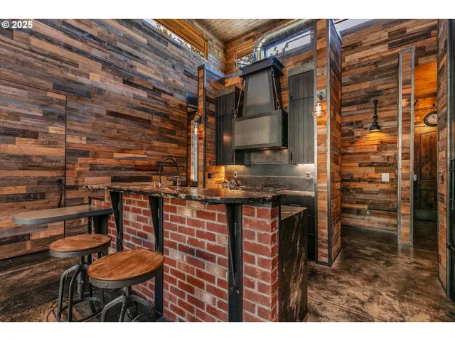 a view of a chairs and table in the patio