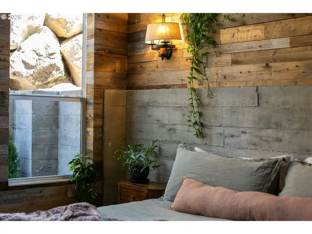 a picture of a bathroom with a shower and a mirror