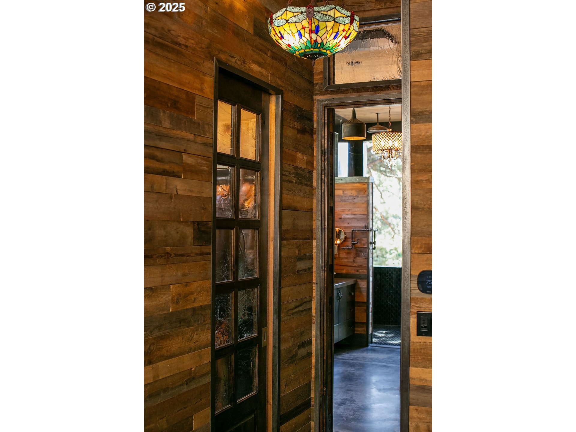 19476 Southwest Century Drive Bend, OR 97702 - Photo 19 of 44 a picture of a bathroom with a shower and a mirror