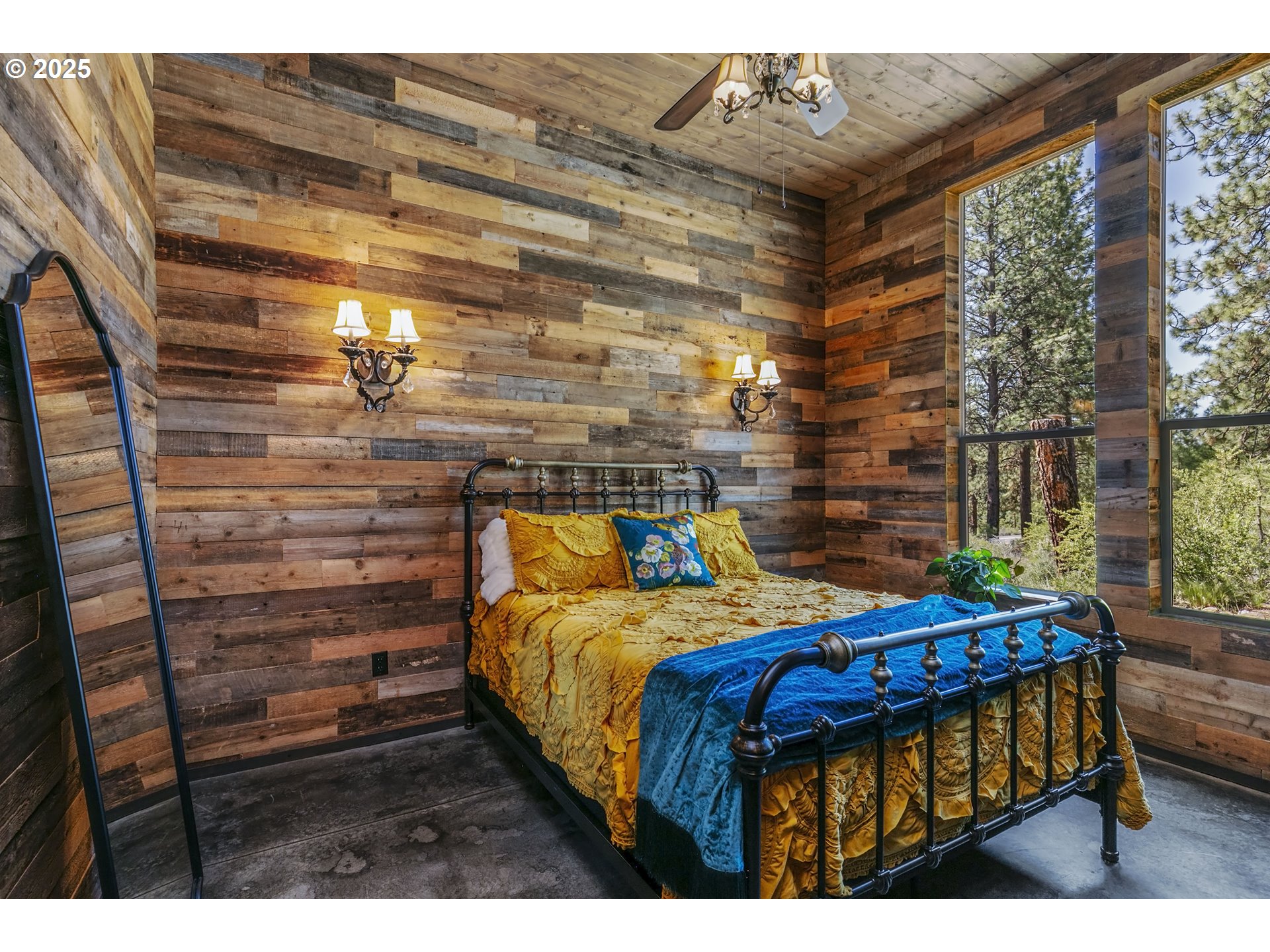 19476 Southwest Century Drive Bend, OR 97702 - Photo 24 of 44 a bedroom with a bed and a window