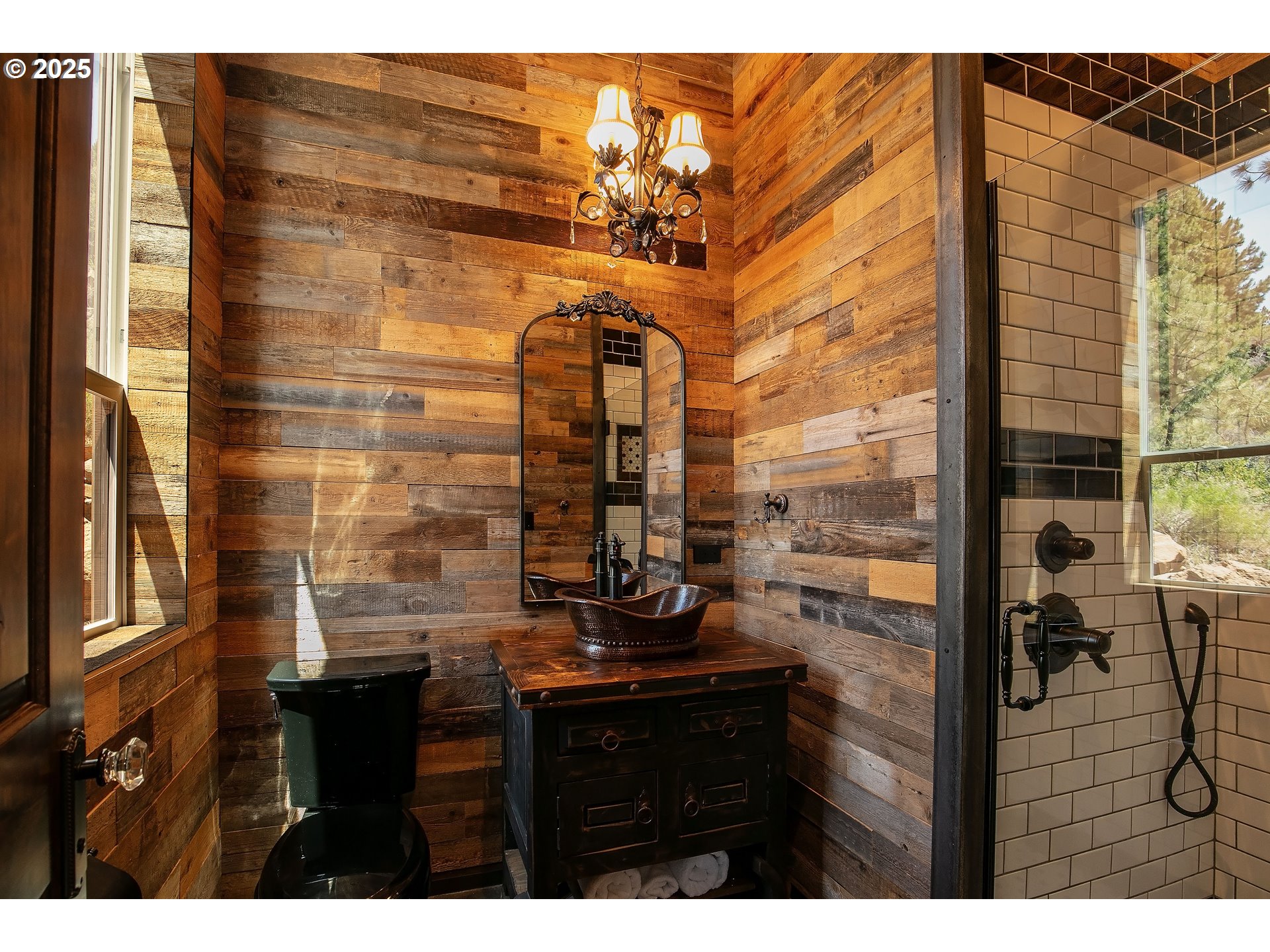 19476 Southwest Century Drive Bend, OR 97702 - Photo 26 of 44 a bathroom with a sink and a mirror