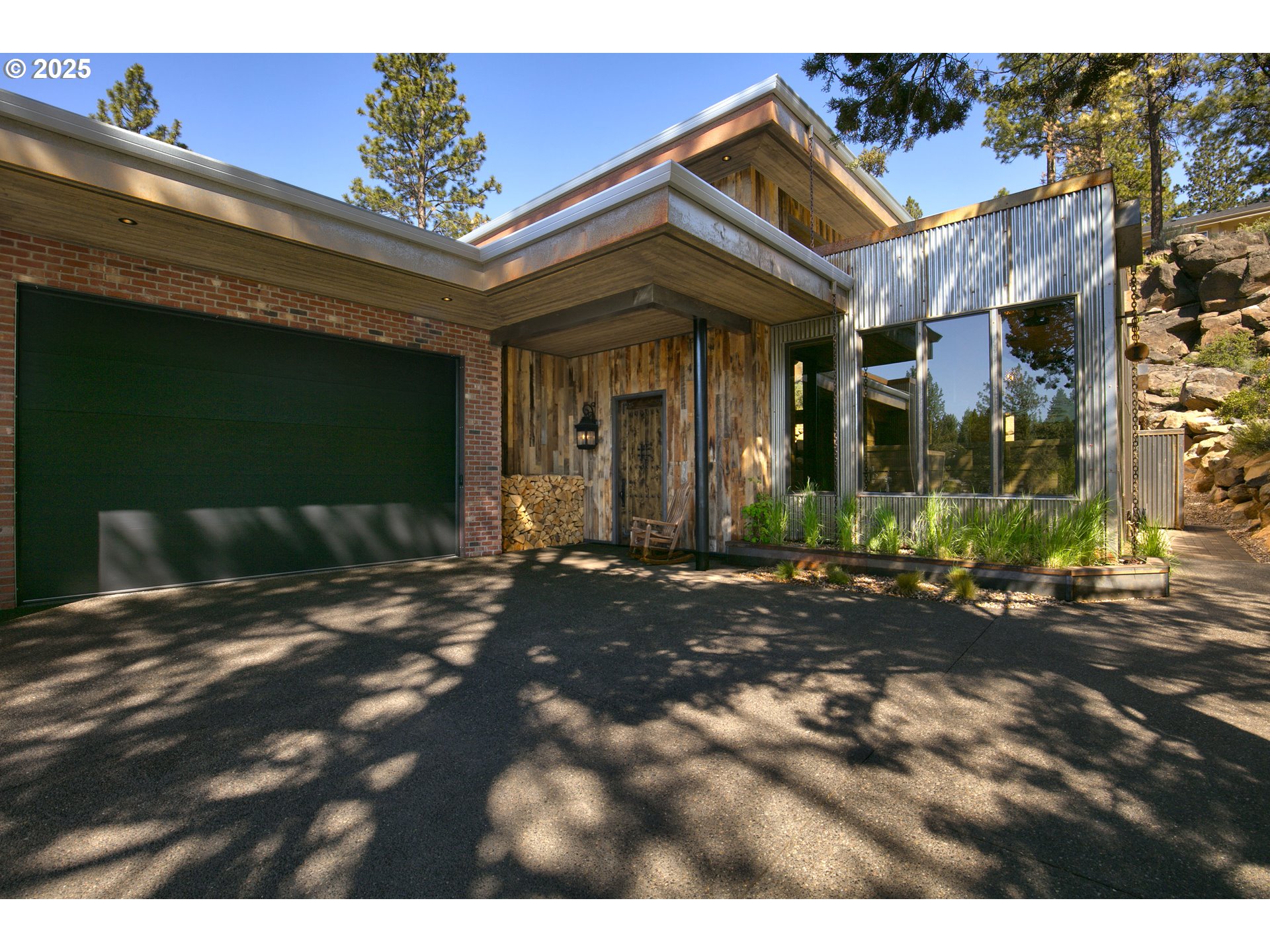19476 Southwest Century Drive Bend, OR 97702 - Photo 3 of 44 a view of a house with a patio