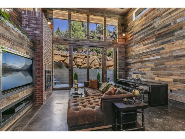 a view of a chairs and table in the patio