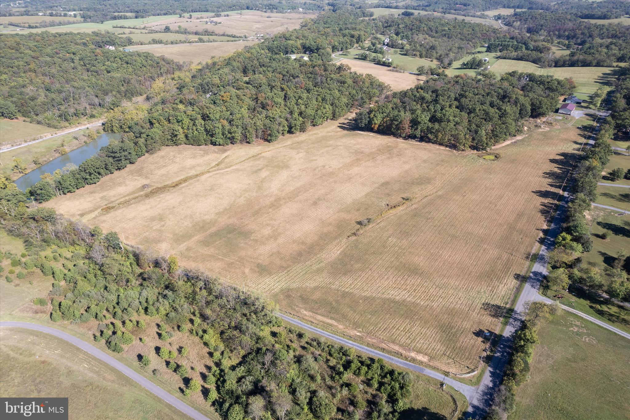 Lot 6 Gun Club Road Stephenson, VA 22656 - Photo 2 of 10 a view of a dry yard with wooden fence
