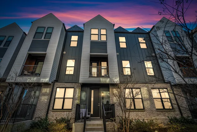 a front view of a multi story residential apartment building