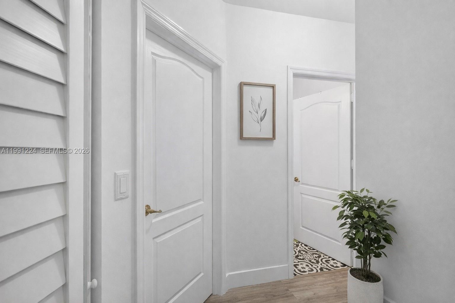 16299 Southwest 103rd Street Miami, FL 33196 - Photo 23 of 30 a room with a potted plant