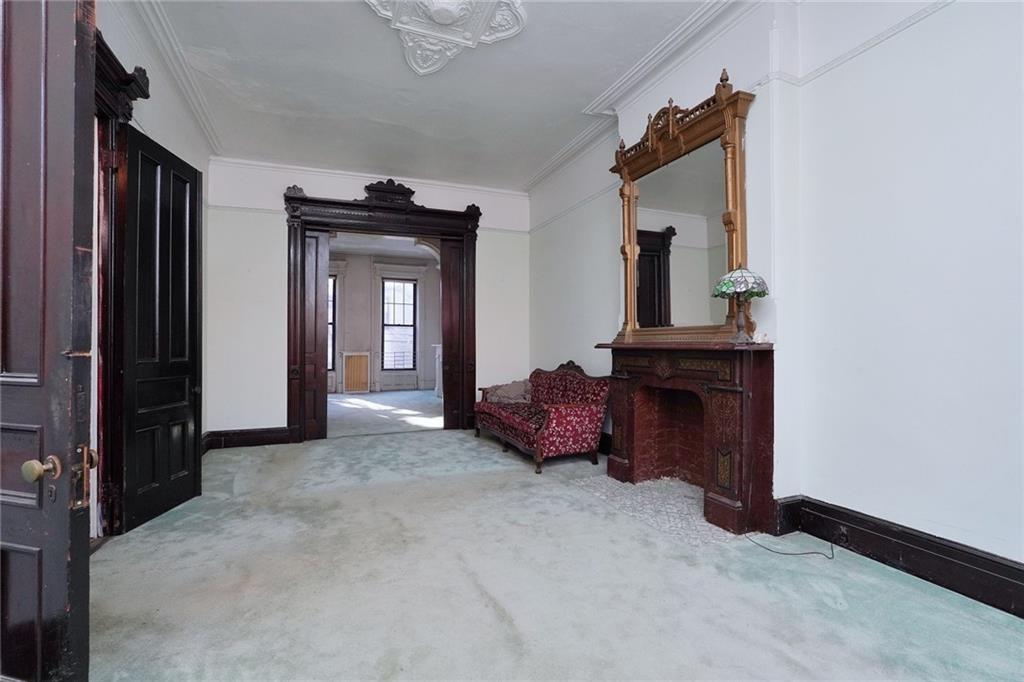 378 8th Street Brooklyn, NY 11215 - Photo 12 of 37 a view of livingroom with furniture and staircase
