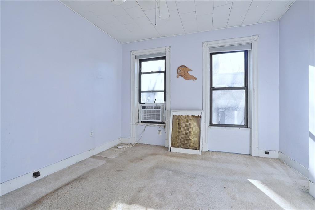 378 8th Street Brooklyn, NY 11215 - Photo 25 of 37 an empty room with windows