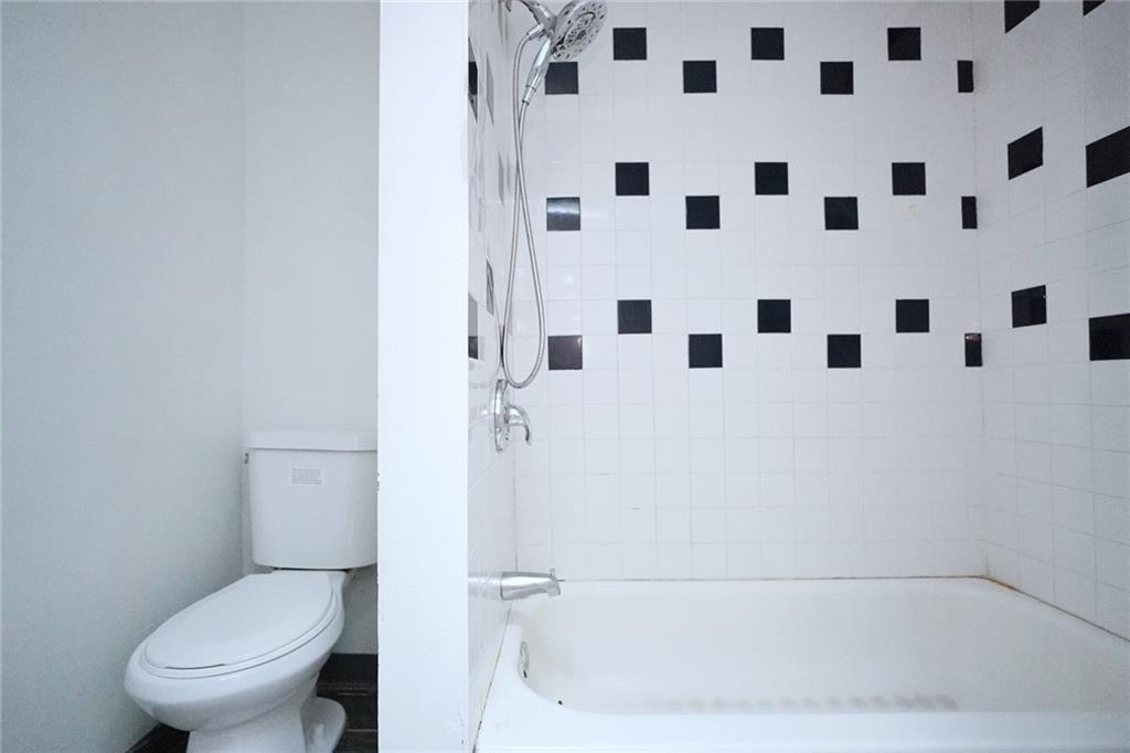 378 8th Street Brooklyn, NY 11215 - Photo 29 of 37 a white toilet sitting next to a white sink