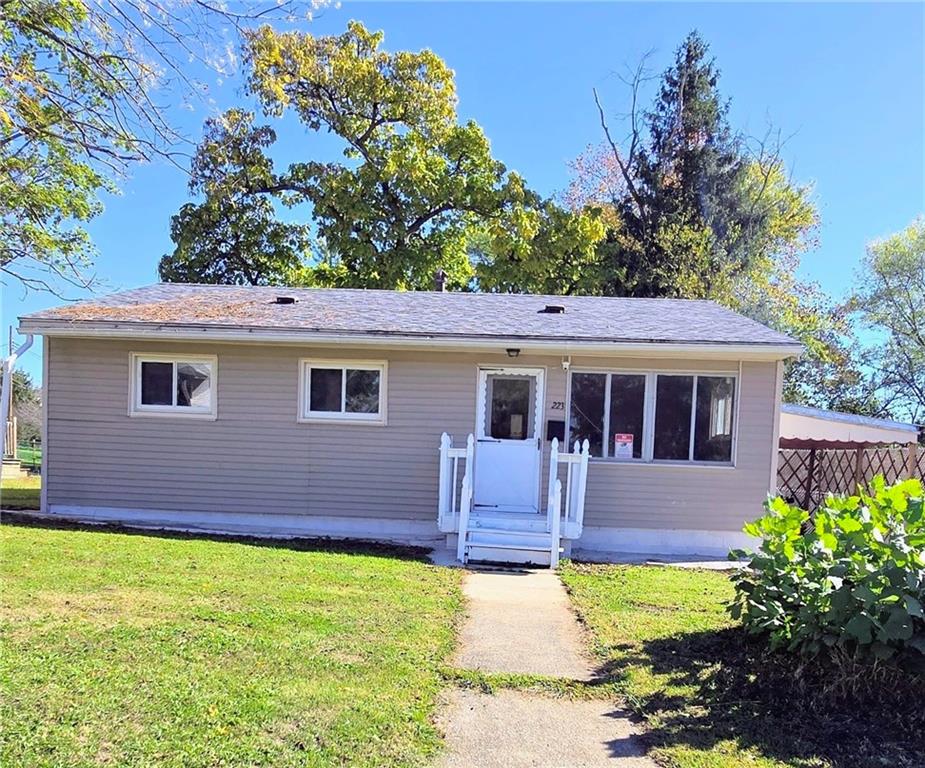 223 Emerson Avenue Farrell, PA 16121 - Photo 1 of 25 a front view of a house with garden