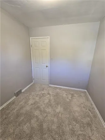 an empty room with a workbench