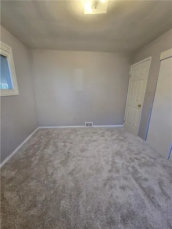 an empty room with a window