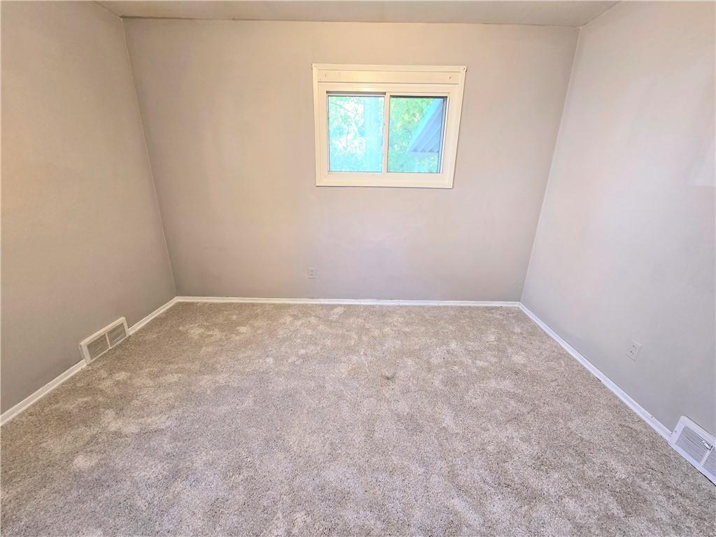 223 Emerson Avenue Farrell, PA 16121 - Photo 20 of 25 an empty room with a window