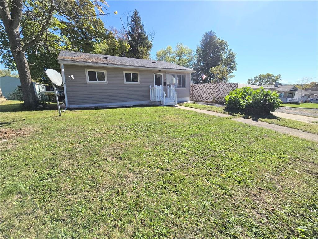 223 Emerson Avenue Farrell, PA 16121 - Photo 3 of 25 a house view with a garden space
