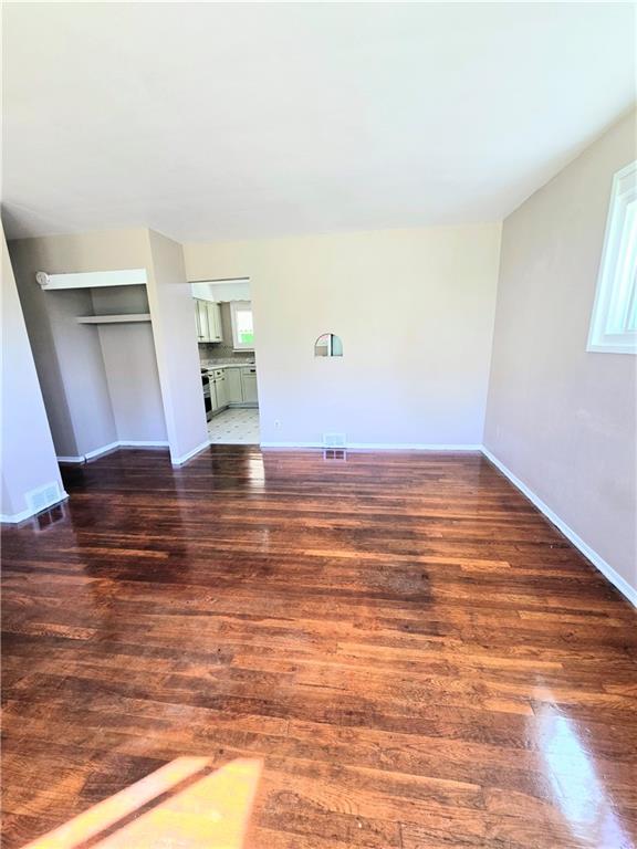 223 Emerson Avenue Farrell, PA 16121 - Photo 8 of 25 a view of room with wooden floor