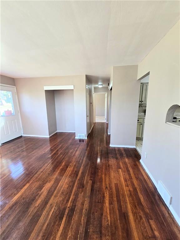 223 Emerson Avenue Farrell, PA 16121 - Photo 9 of 25 a view of empty room with wooden floor