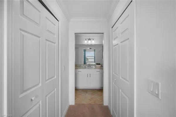 a bathroom with a sink and mirror