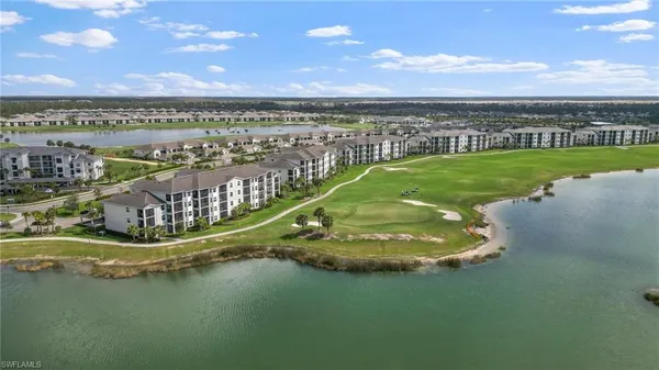 a view of a lake with a big yard