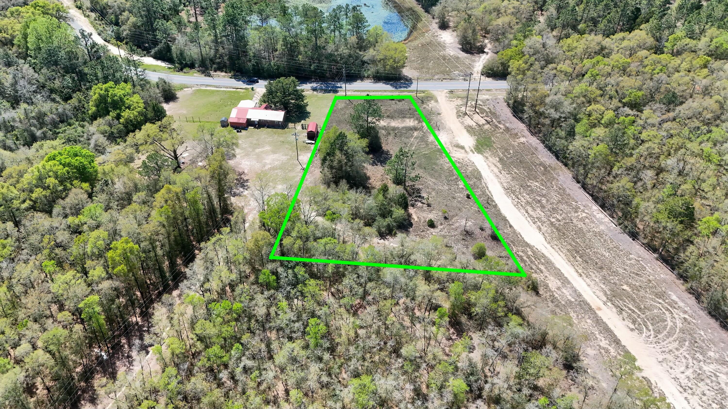 0 North 20th Street DeFuniak Springs, FL 32433 - Photo 3 of 11 a backyard view with potted plants