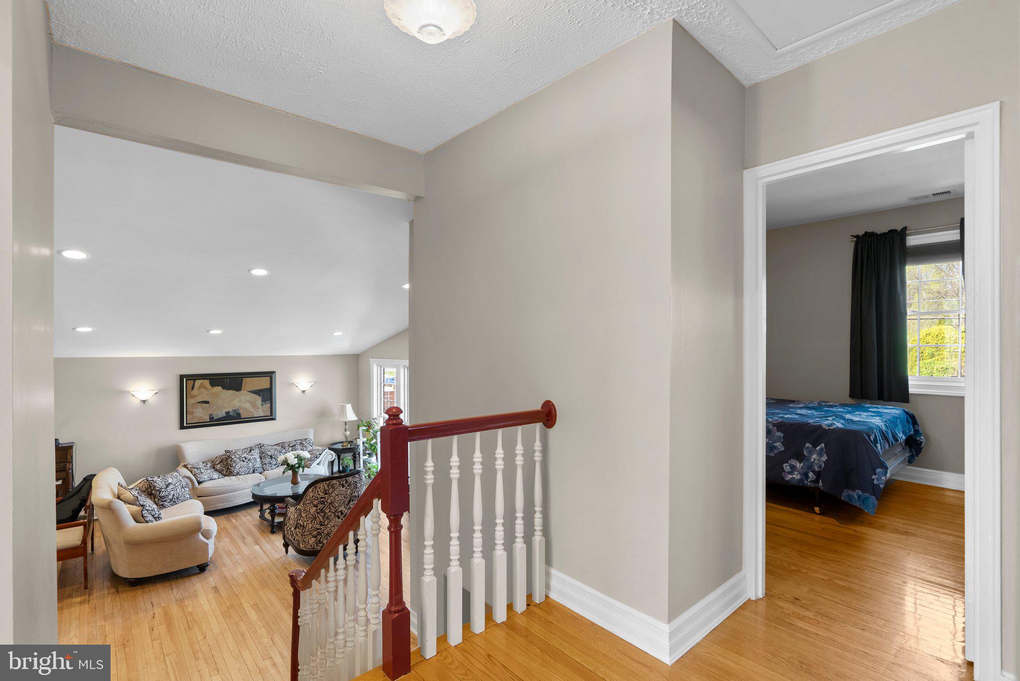 13131 Holdridge Road Silver Spring, MD 20906 - Photo 17 of 41 a living room with furniture and a wooden floor