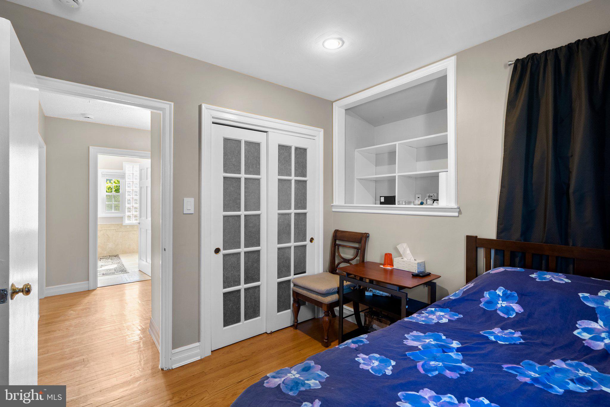 13131 Holdridge Road Silver Spring, MD 20906 - Photo 18 of 41 a bedroom with bed and a window