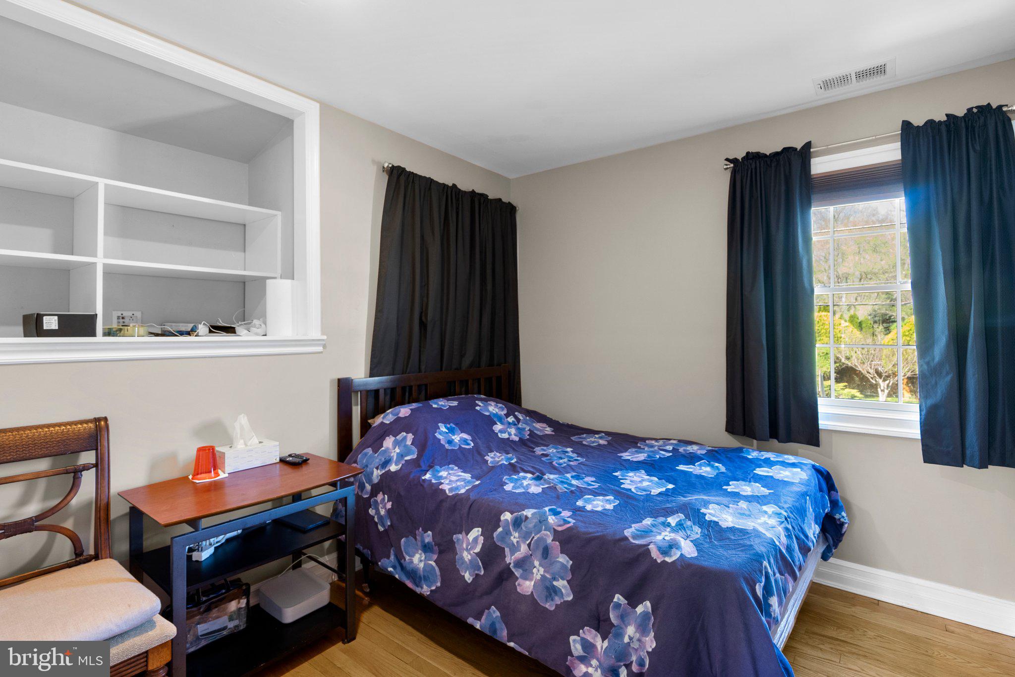 13131 Holdridge Road Silver Spring, MD 20906 - Photo 19 of 41 a bedroom with a bed and a window