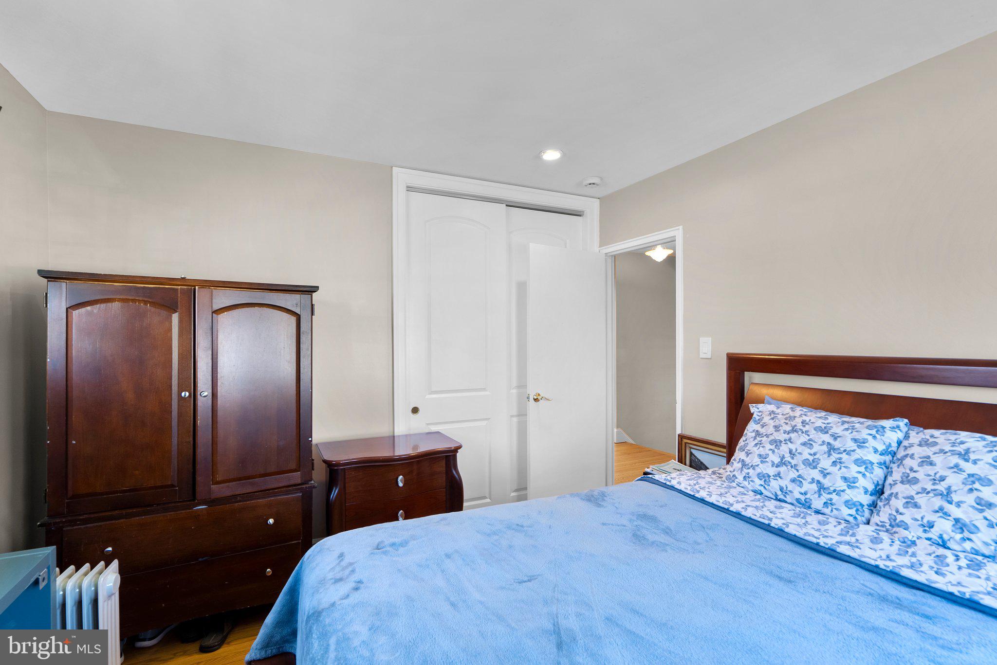 13131 Holdridge Road Silver Spring, MD 20906 - Photo 20 of 41 a bedroom with a bed and a dresser